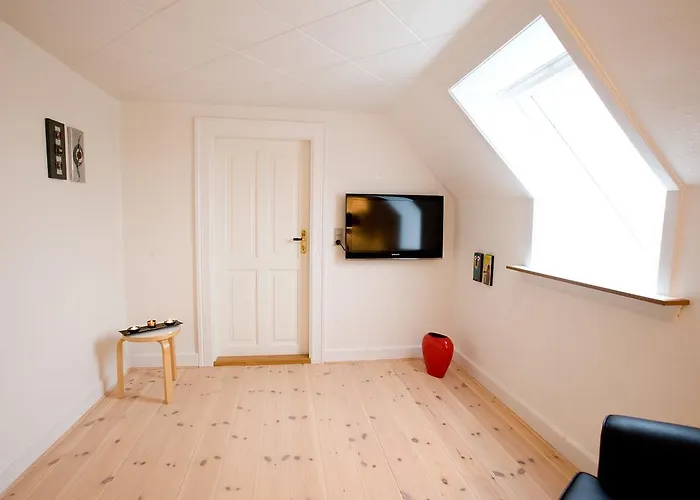 Couette-café Den Gamle Kobmandsgaard Bed & Breakfast